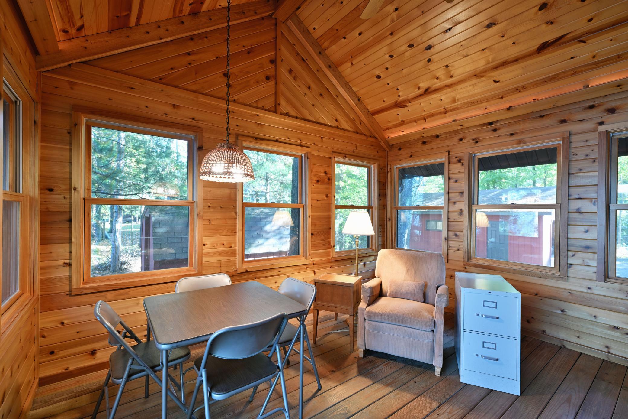 With windows around the entire room, it is a space to enjoy the filtered shade and outdoor views.