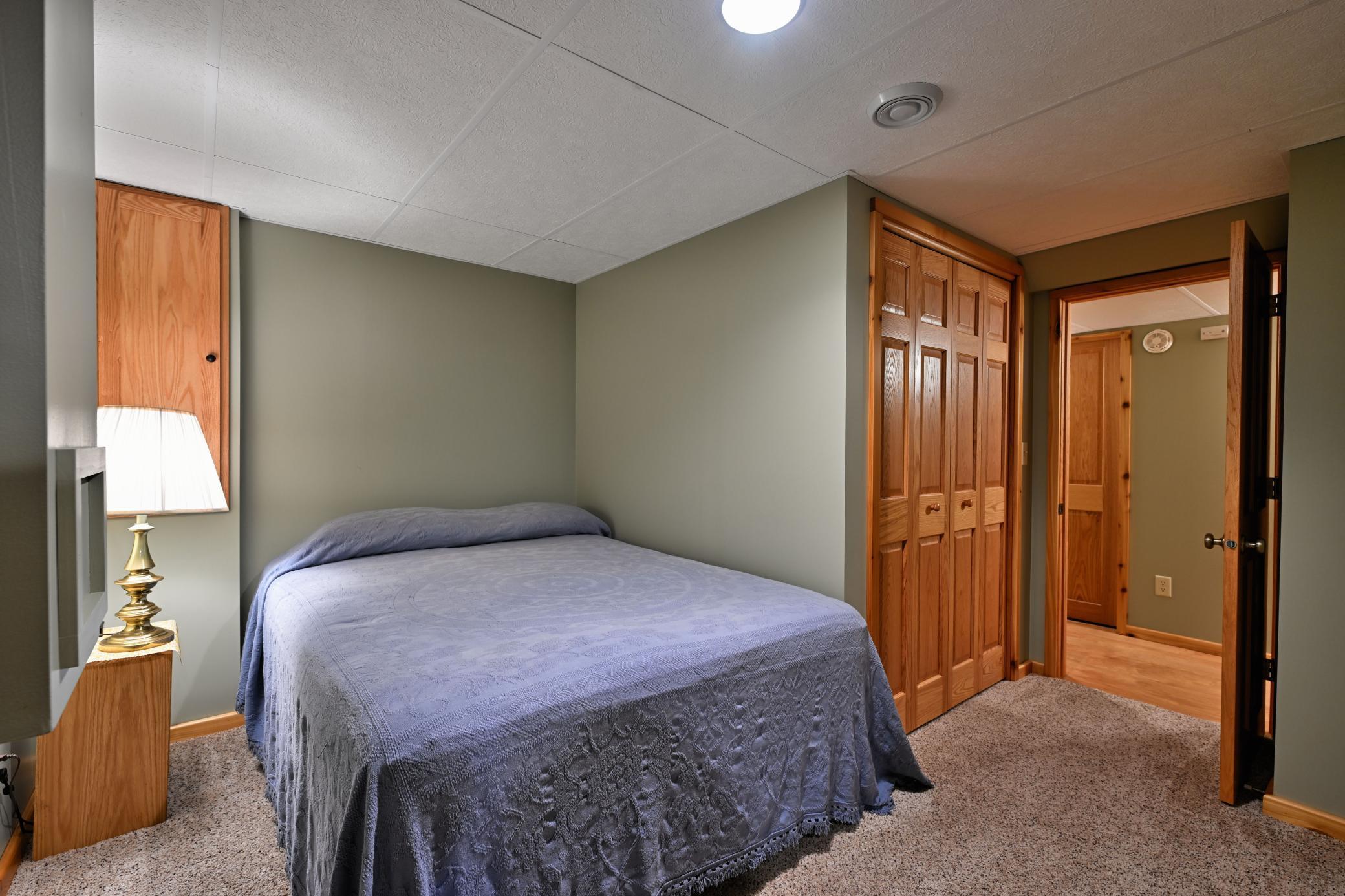 This bedroom has a reach-in closet.