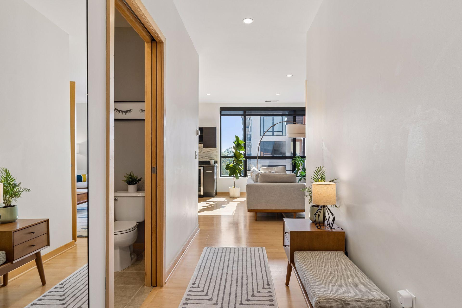 Powder room conveniently located off the foyer.