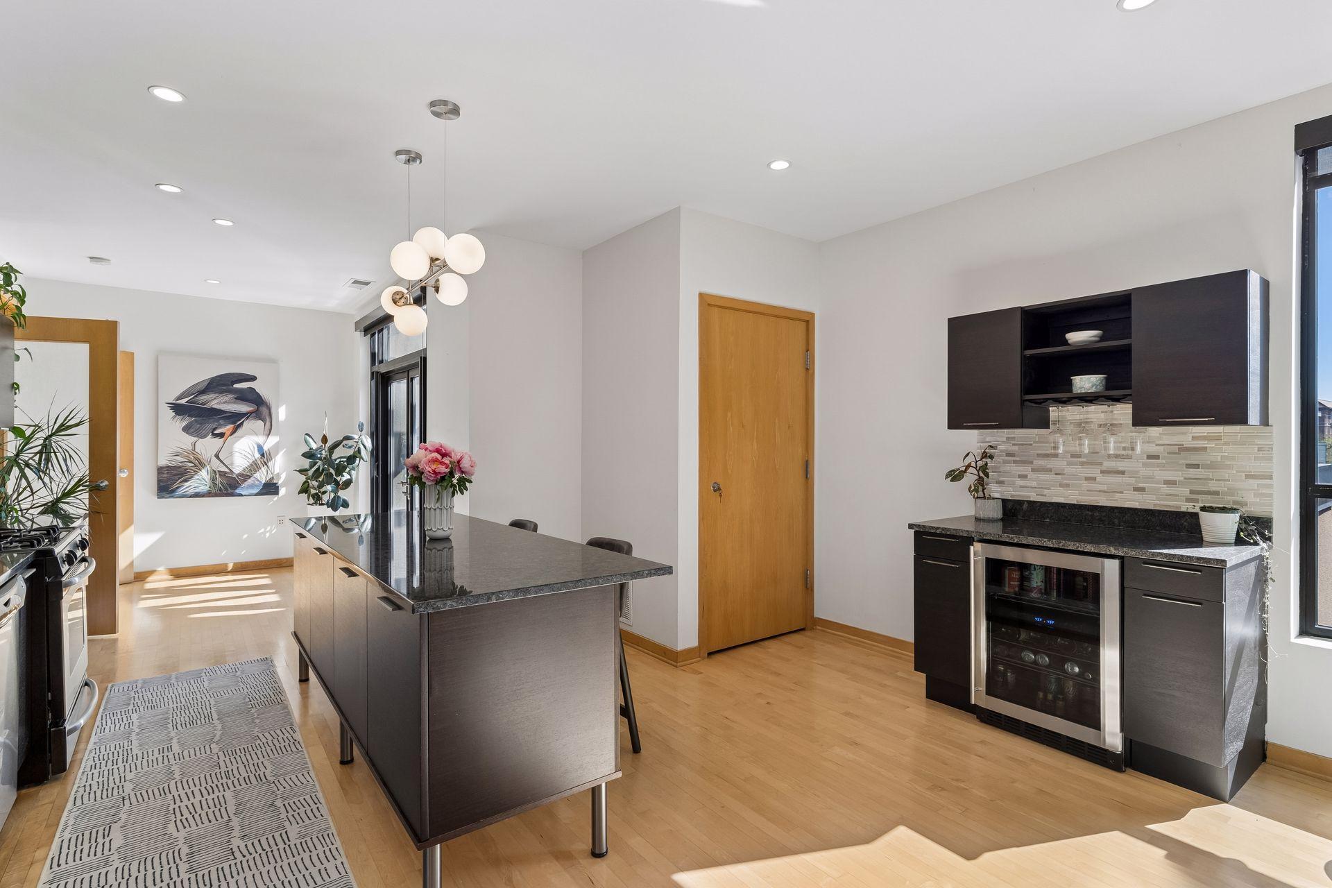 Built-in bar with beverage fridge, great for entertaining. New furnace and A/C in 2021.