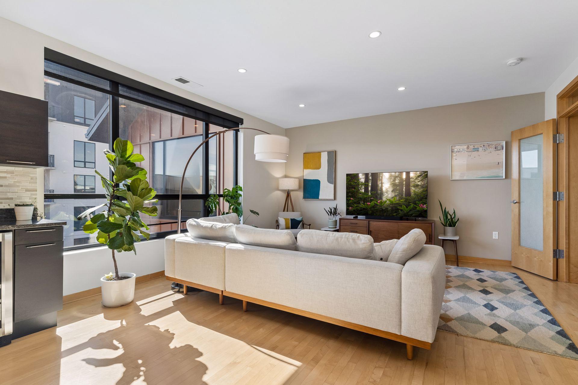 Wall of windows with roll-down blinds.