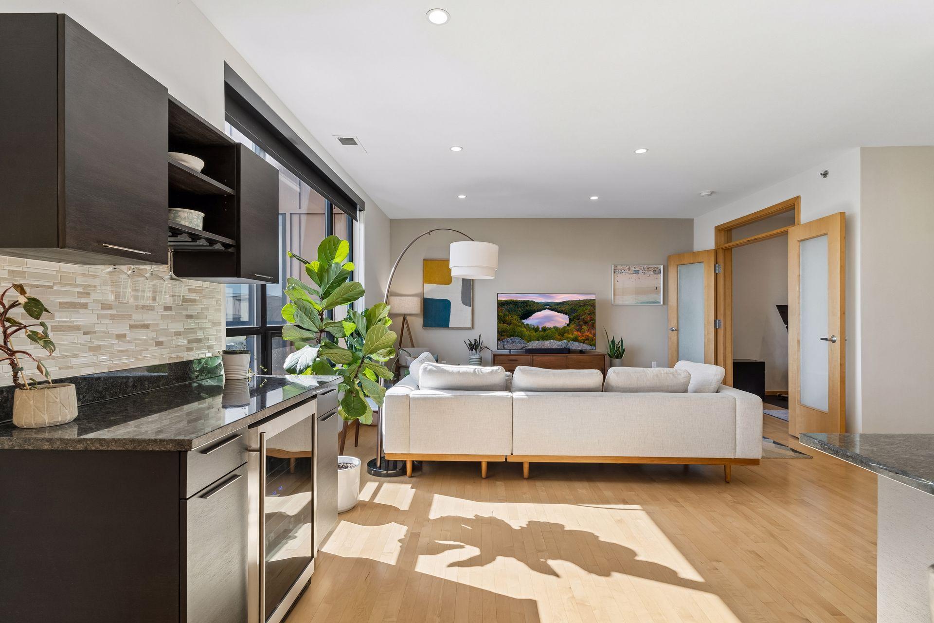 Additional storage space with the built-in bar and mini-fridge.