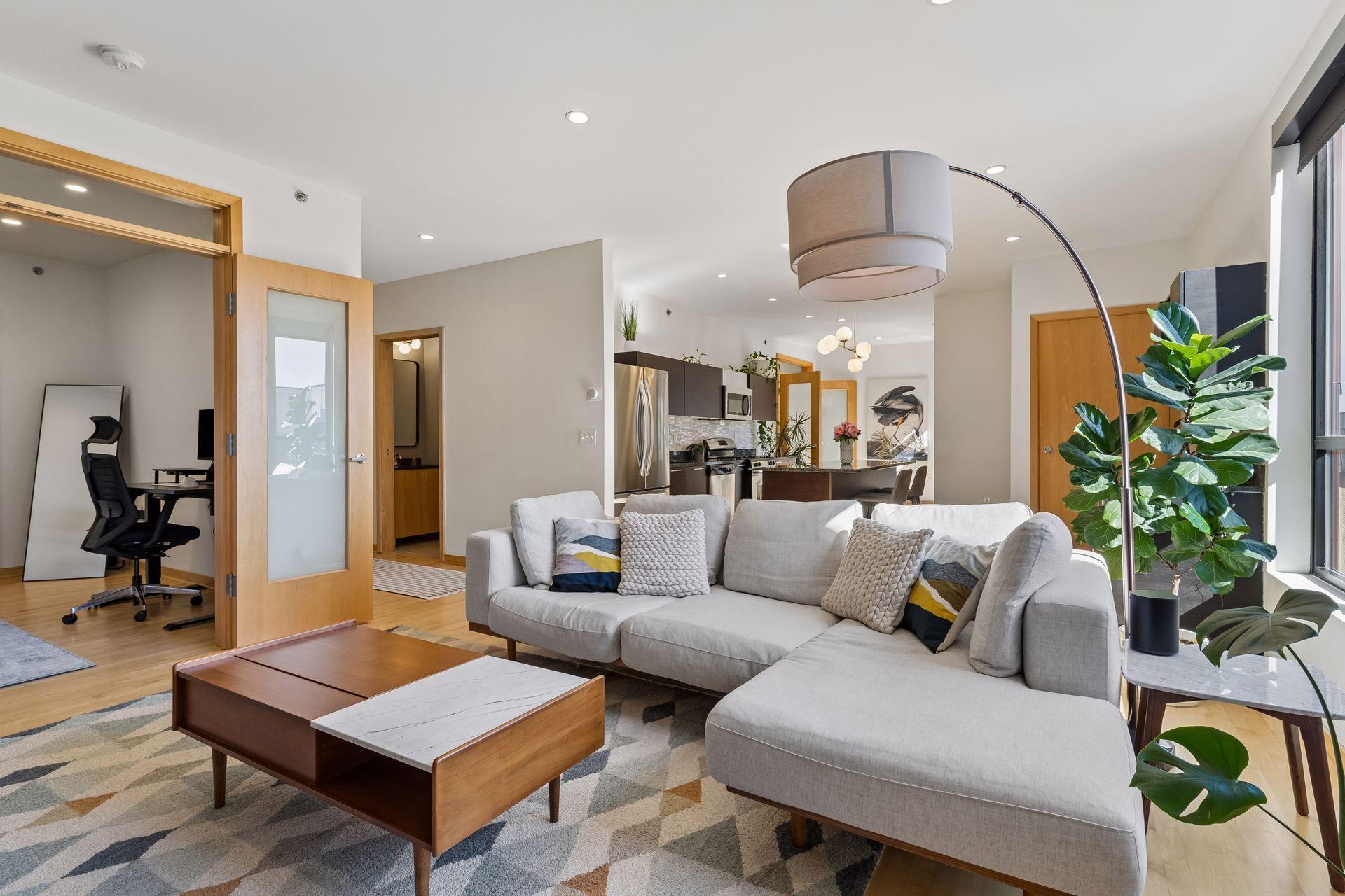 Open concept layout between kitchen, dining and living room.