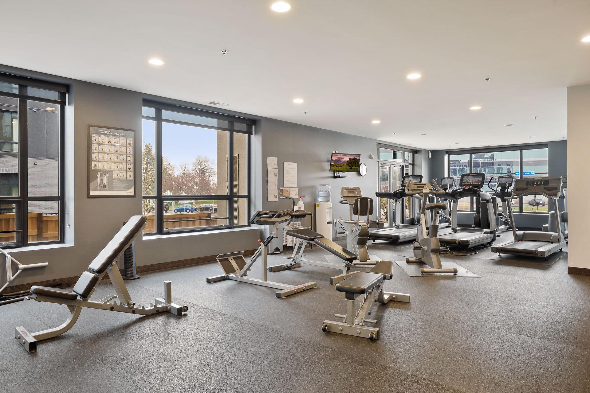 Shared fitness room in the front building. You can access the gym without going outside through the bridge that connects both buildings.