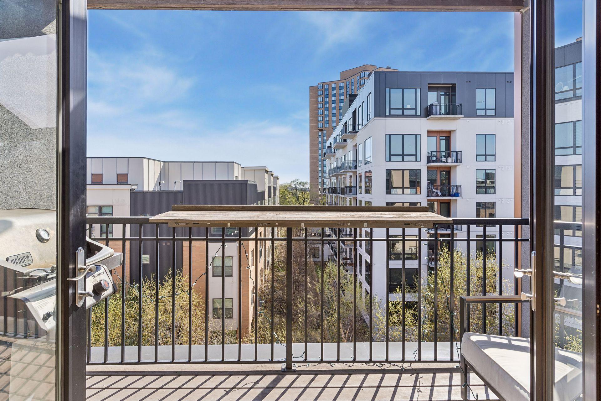 Sturdy composite decking, with gas grill and bar counter. Grill stays with the property (works well).