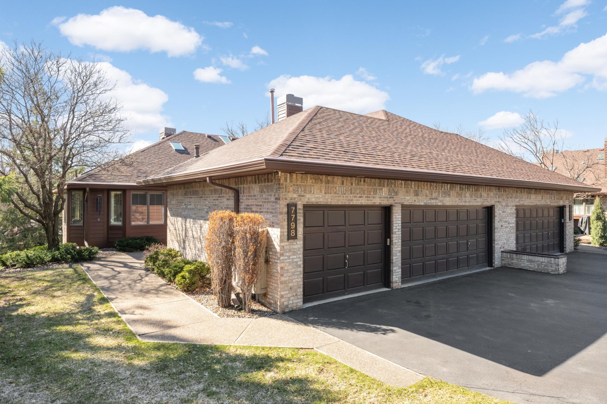 This rare townhome is a and end unit for complete privacy, has south and western exposures for all day sunlight and one of the fe with a 3 car heated garage.