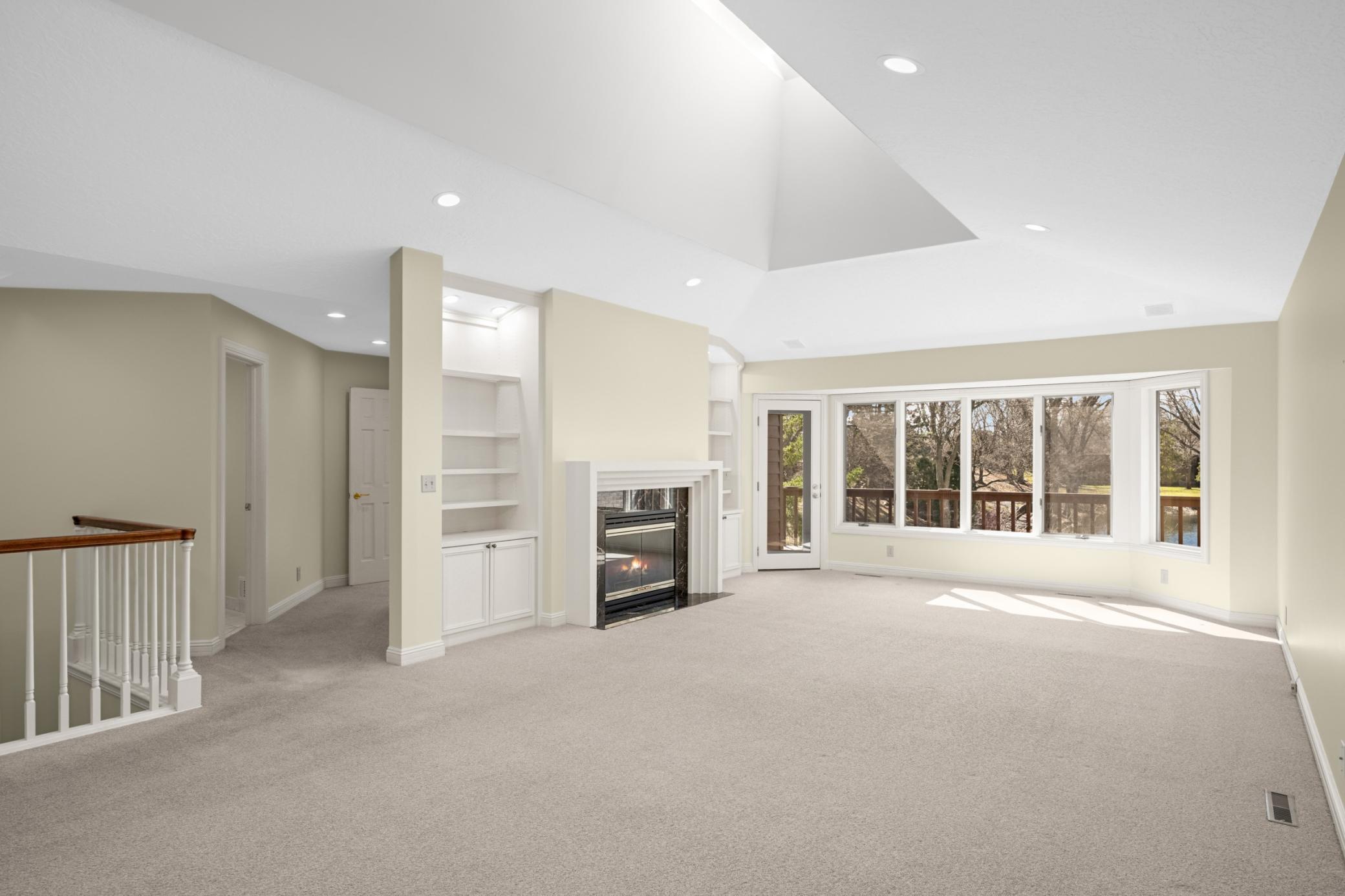 The living room is great for entertaining, has a huge bay window bath a door out to the relaxing deck.