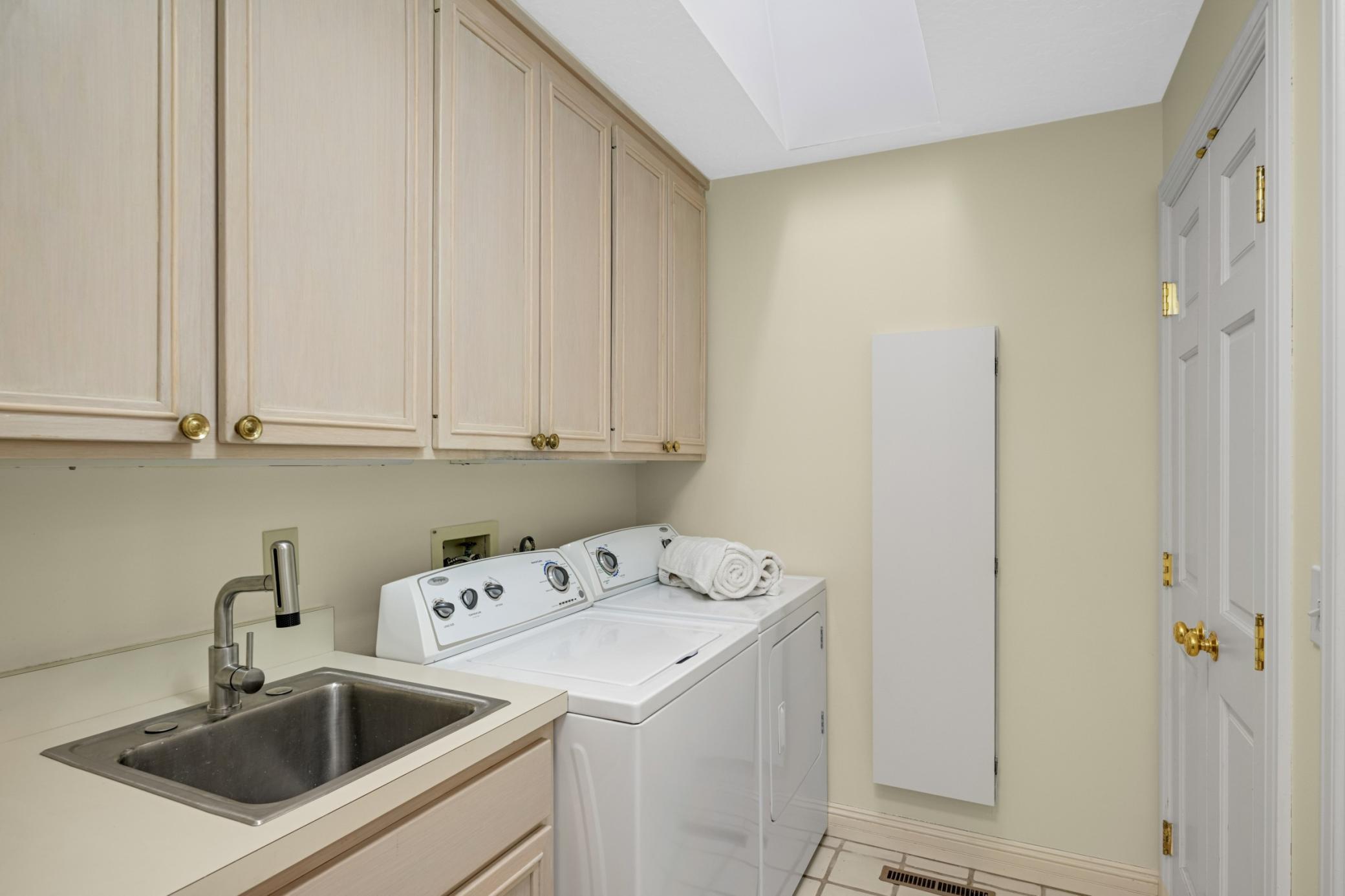 The main floor laundry / mudroom right off the 3 car garage.