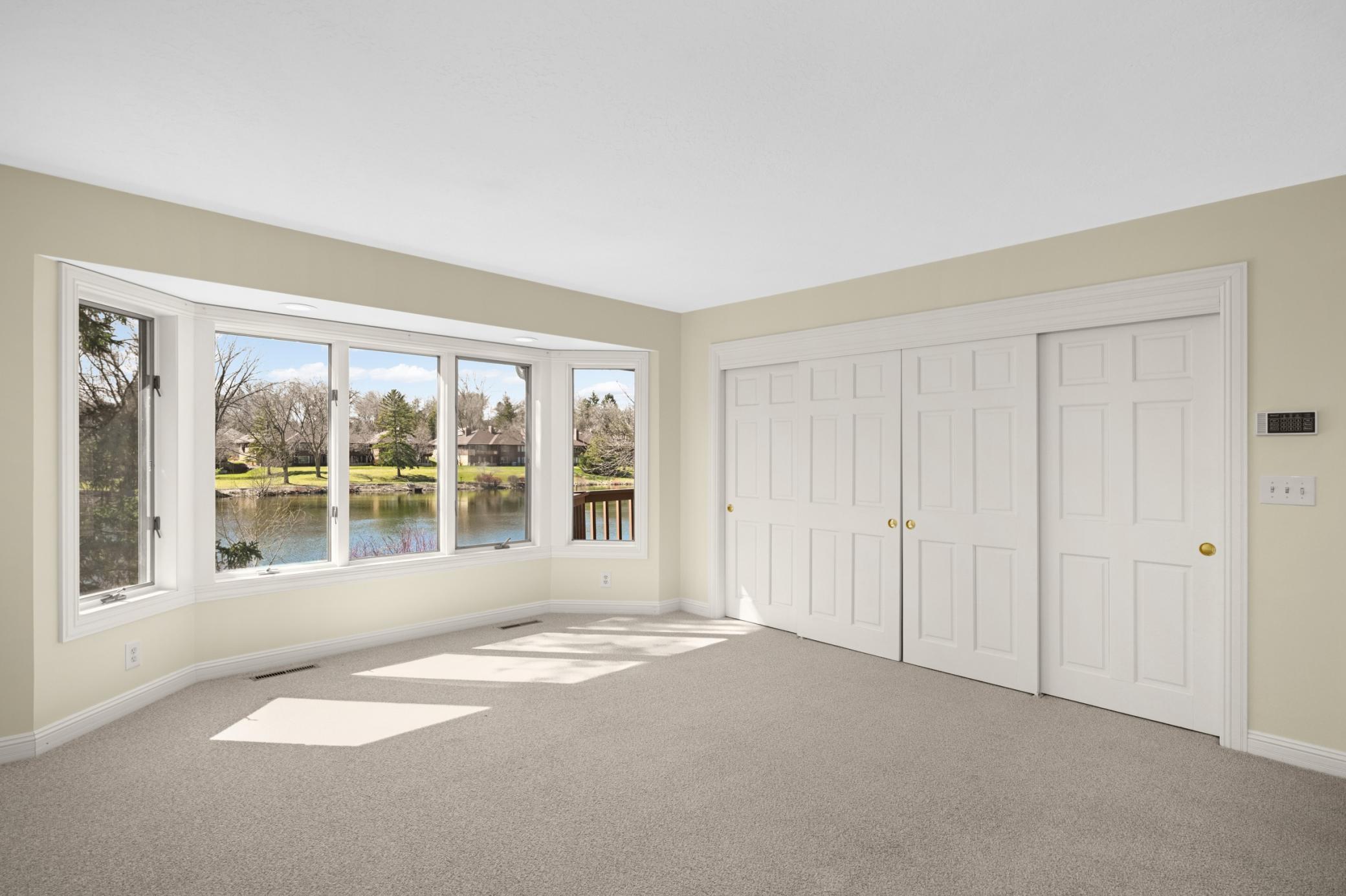 Pond view and a wall of closets.