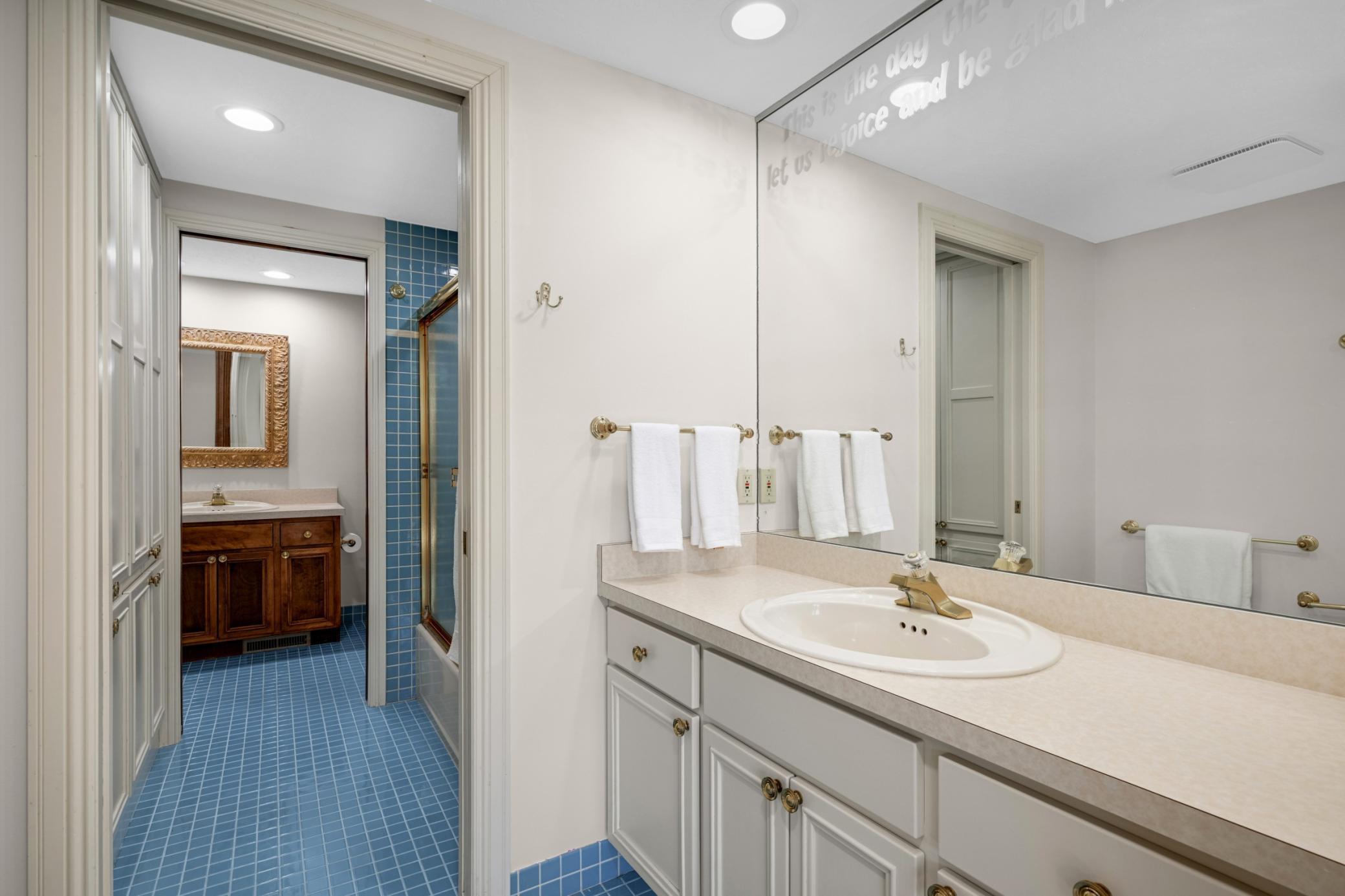 There is an adjacent full walk through bath.