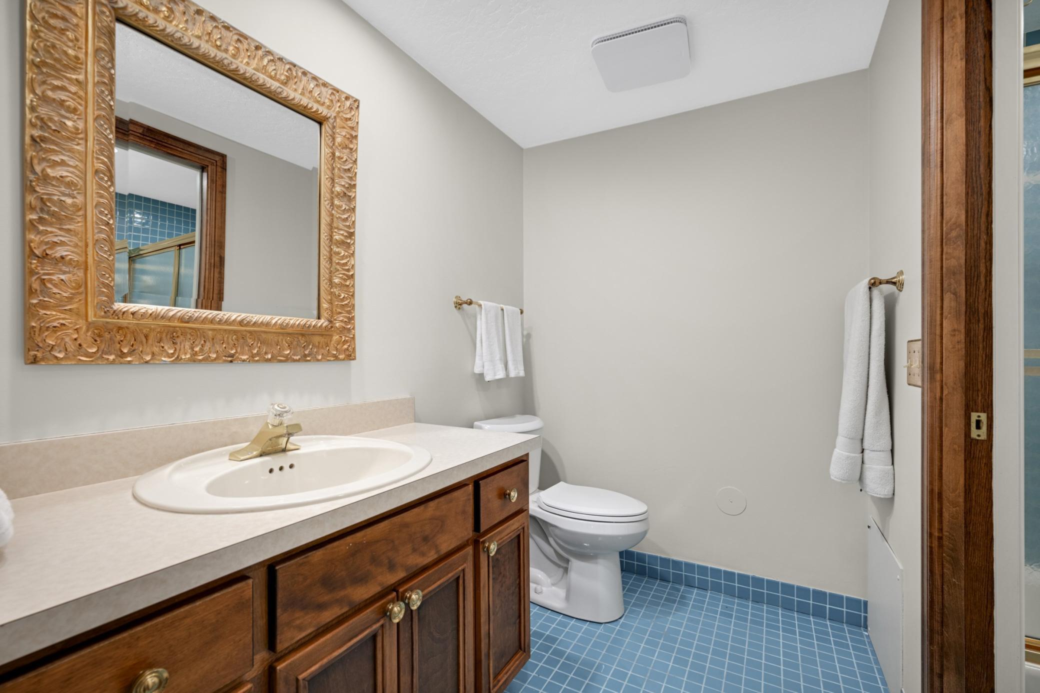 Half bath connects to the full bath for the 3rd bedroom and family room guests.
