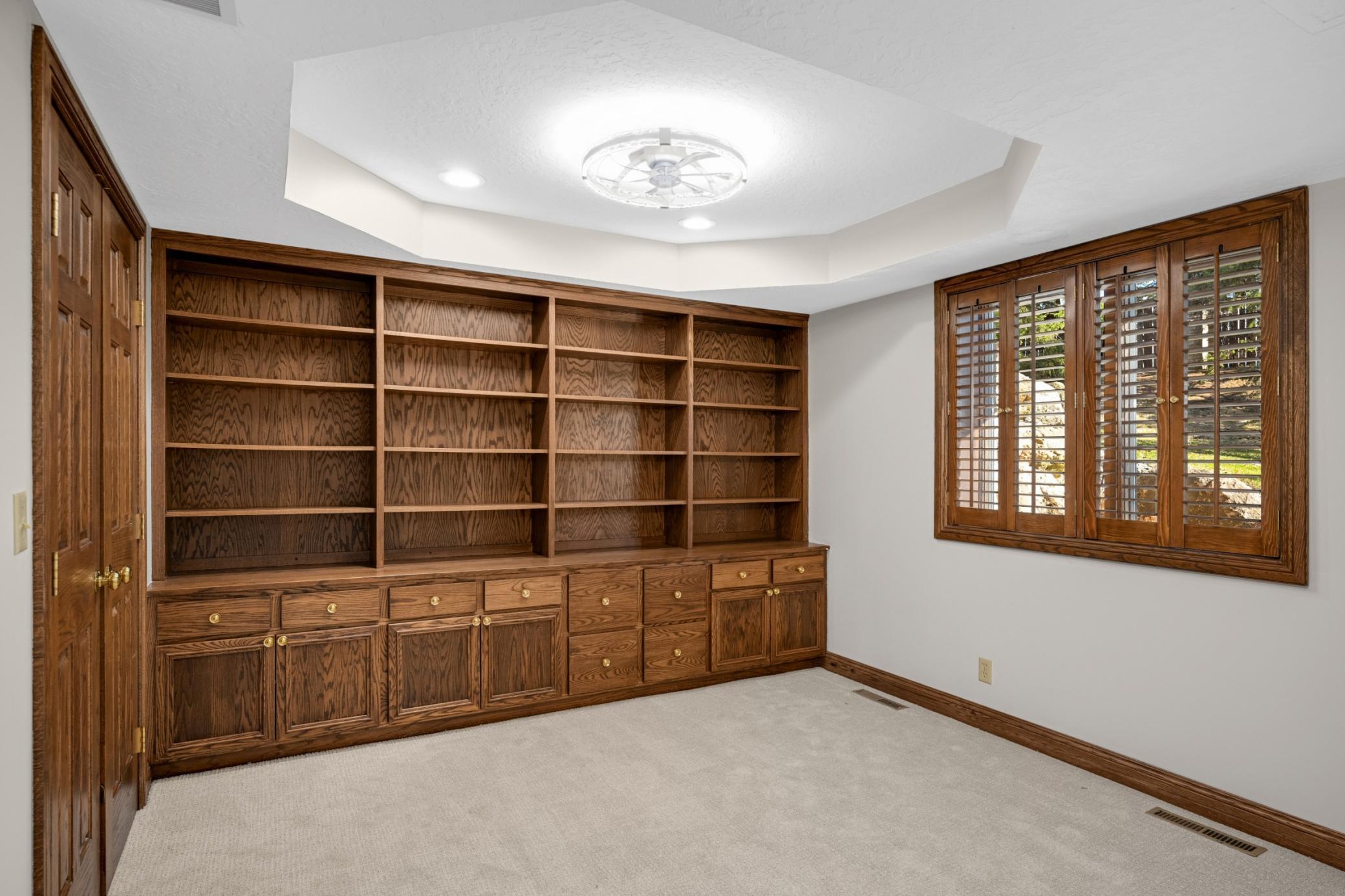 The 3rd legal bedroom (which is very rare) features a all of built-ins and a large closet.