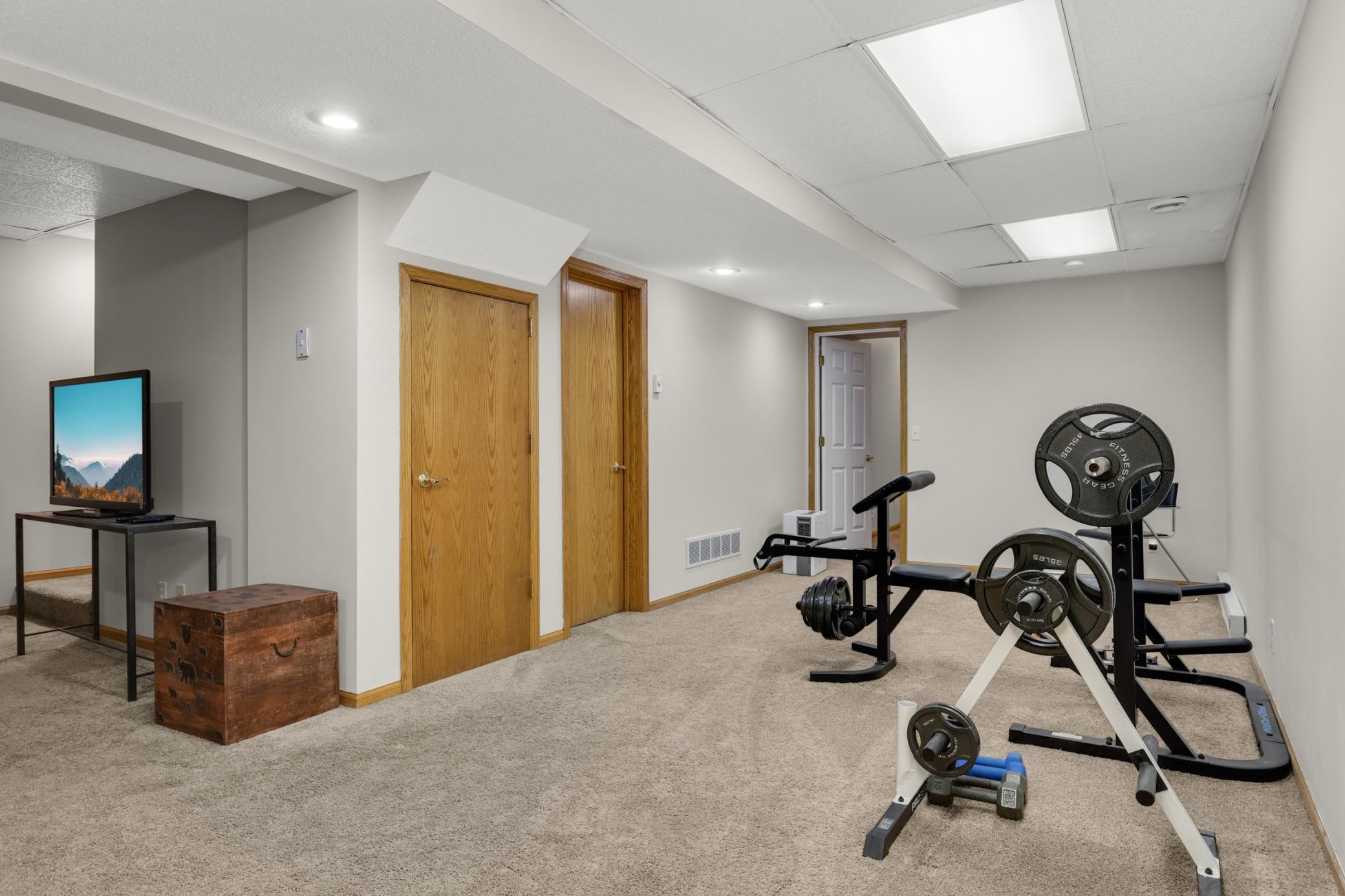 Amusement room currently used as a home gym