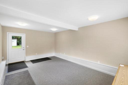 Conference room or storage with access to the back yard