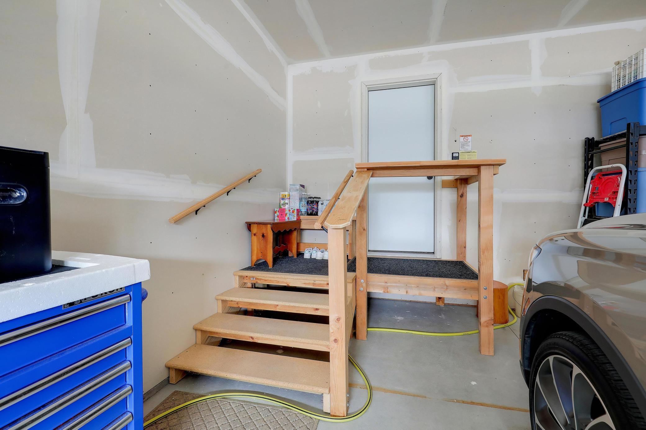 Steps from the garage into the laundry has a convenient landing on it