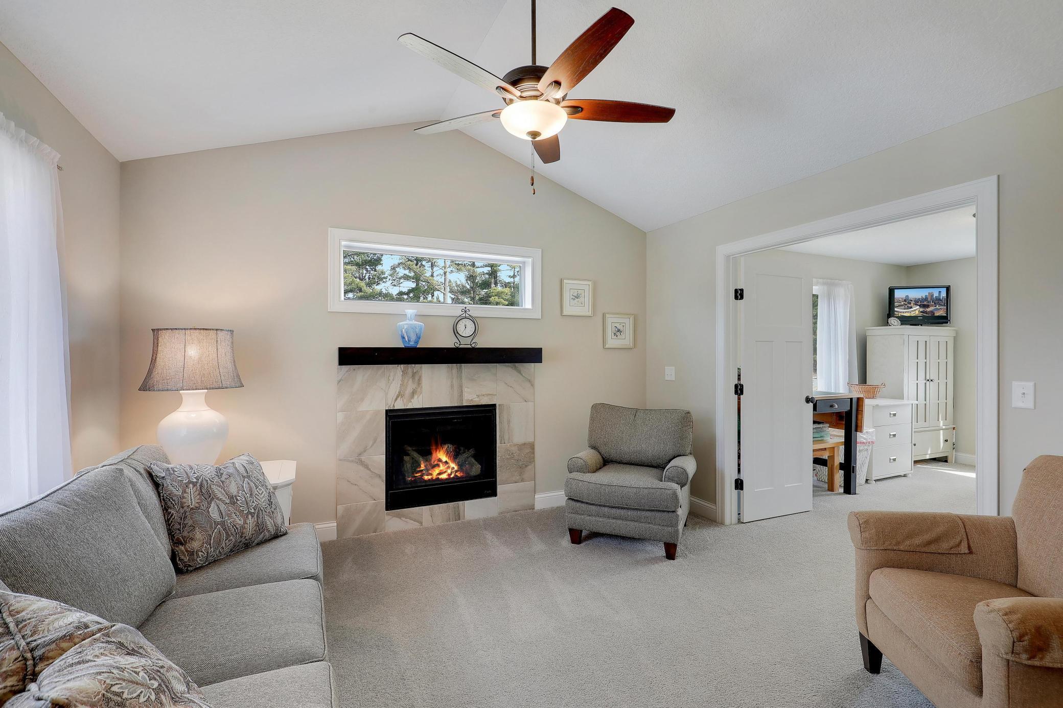 This sun room is also a great place to snuggle up and enjoy the fire in cooler months of the year