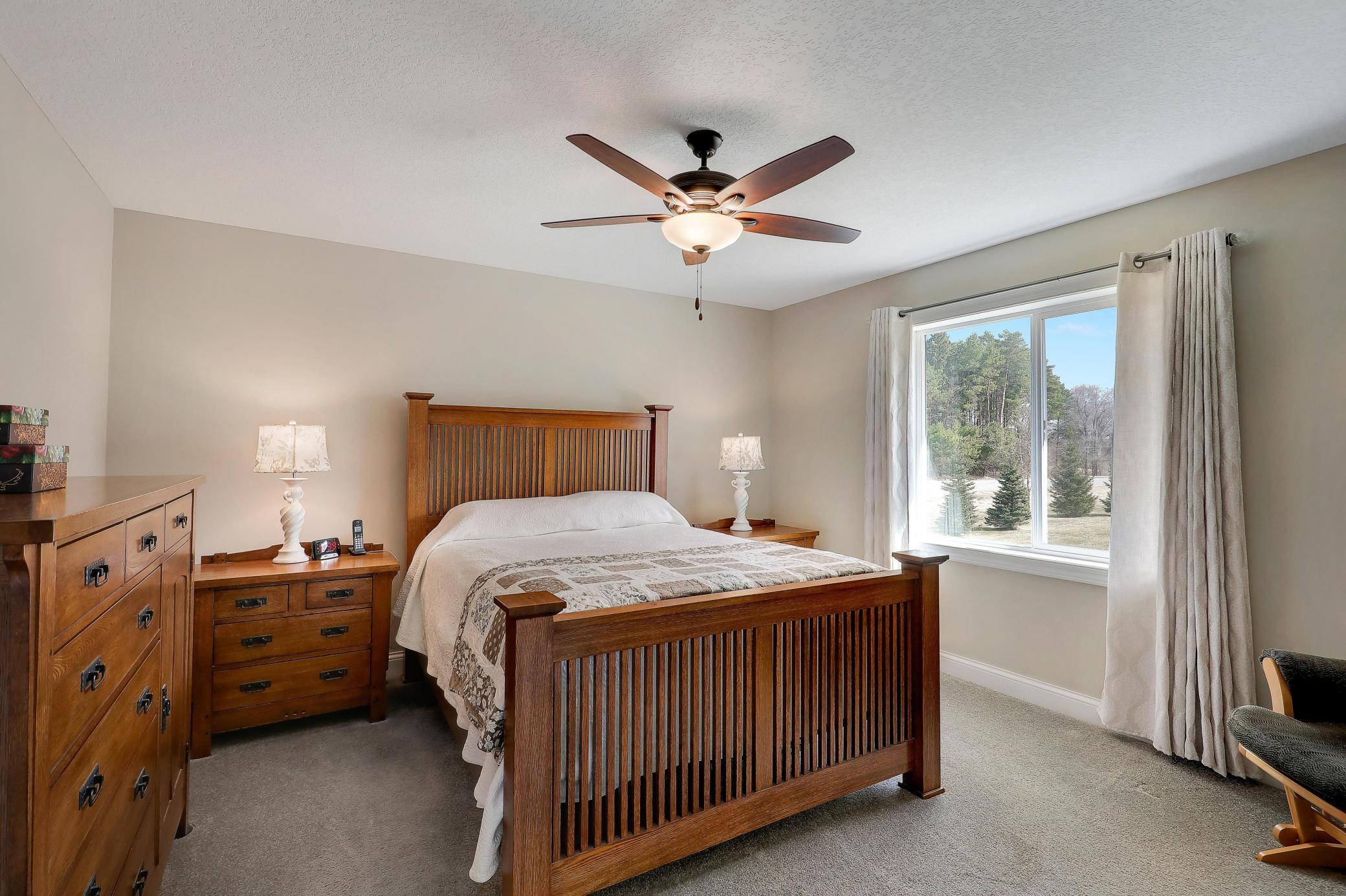 Primary bath boasts a full bath and walk-in closet