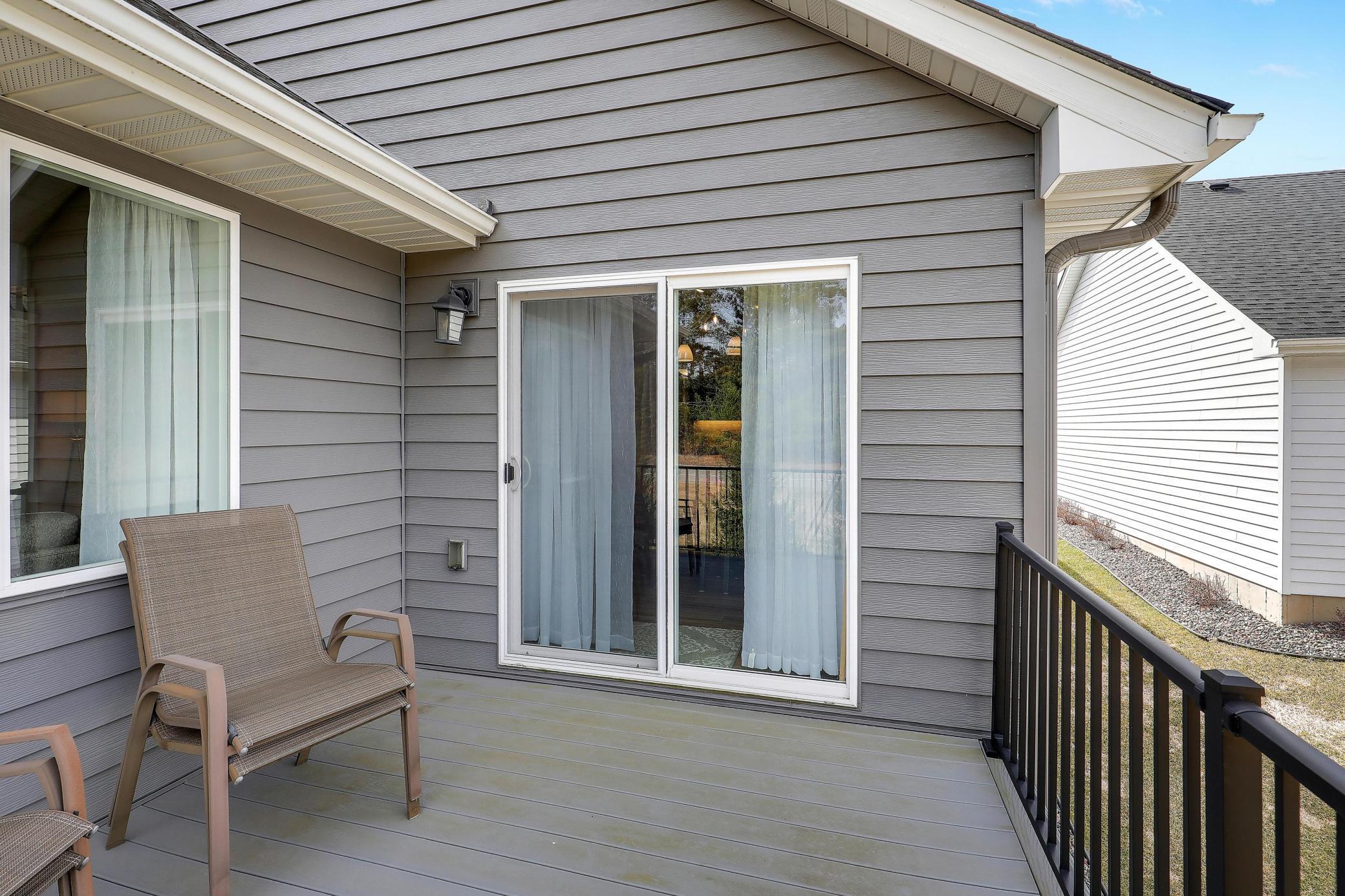 Deck off the dining area is a great spot for grilling and outdoor dining