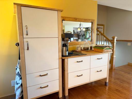 More kitchen cabinetry, featuring the coffee bar.