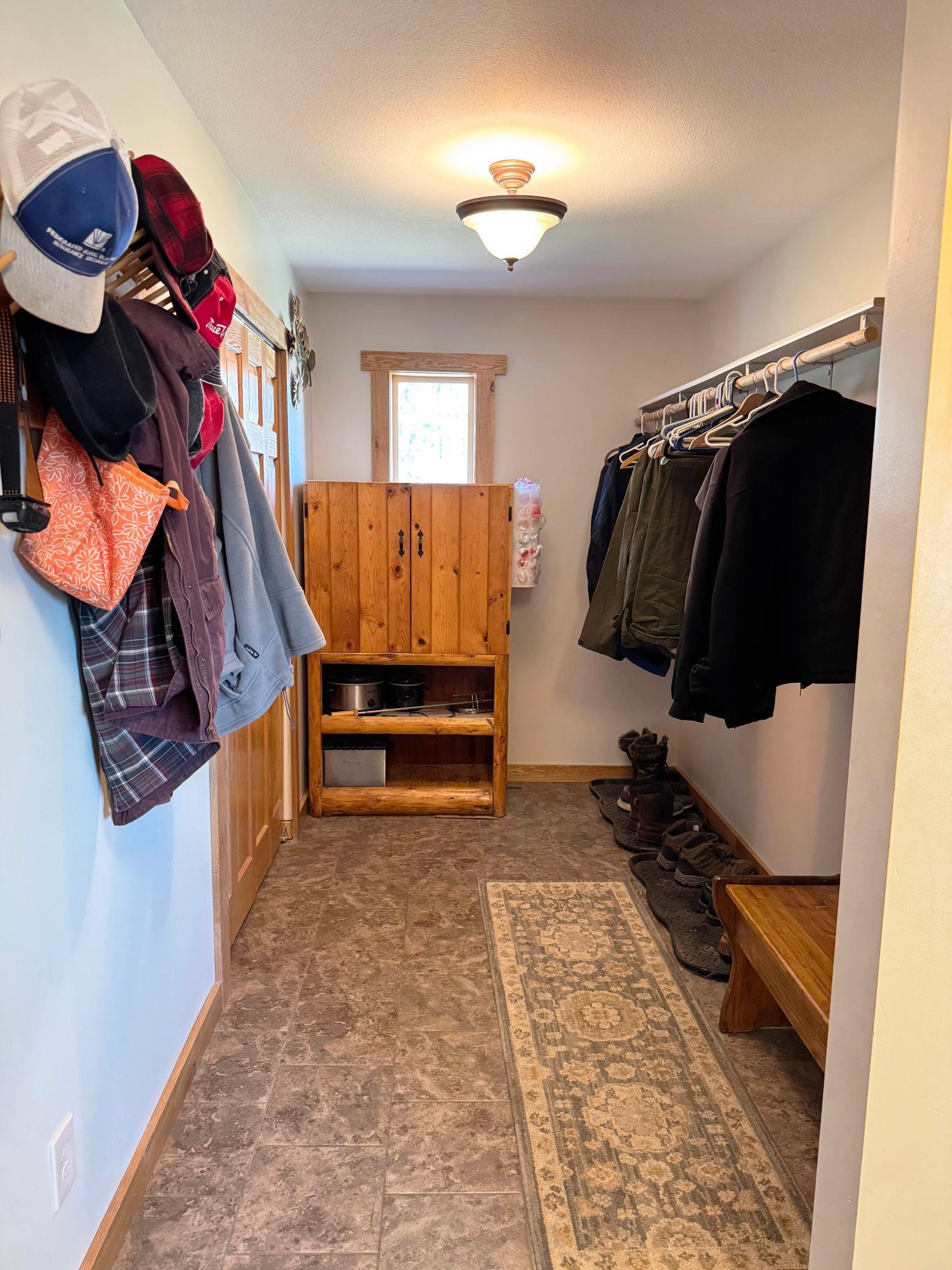 A shot of the mudroom adjacent to the kitchen and dining room.