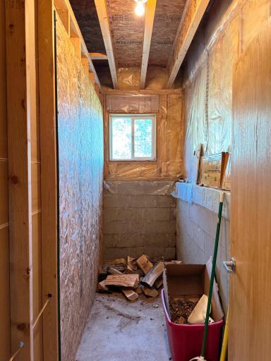 A look at the storage/wood room adjacent to the basement family room.