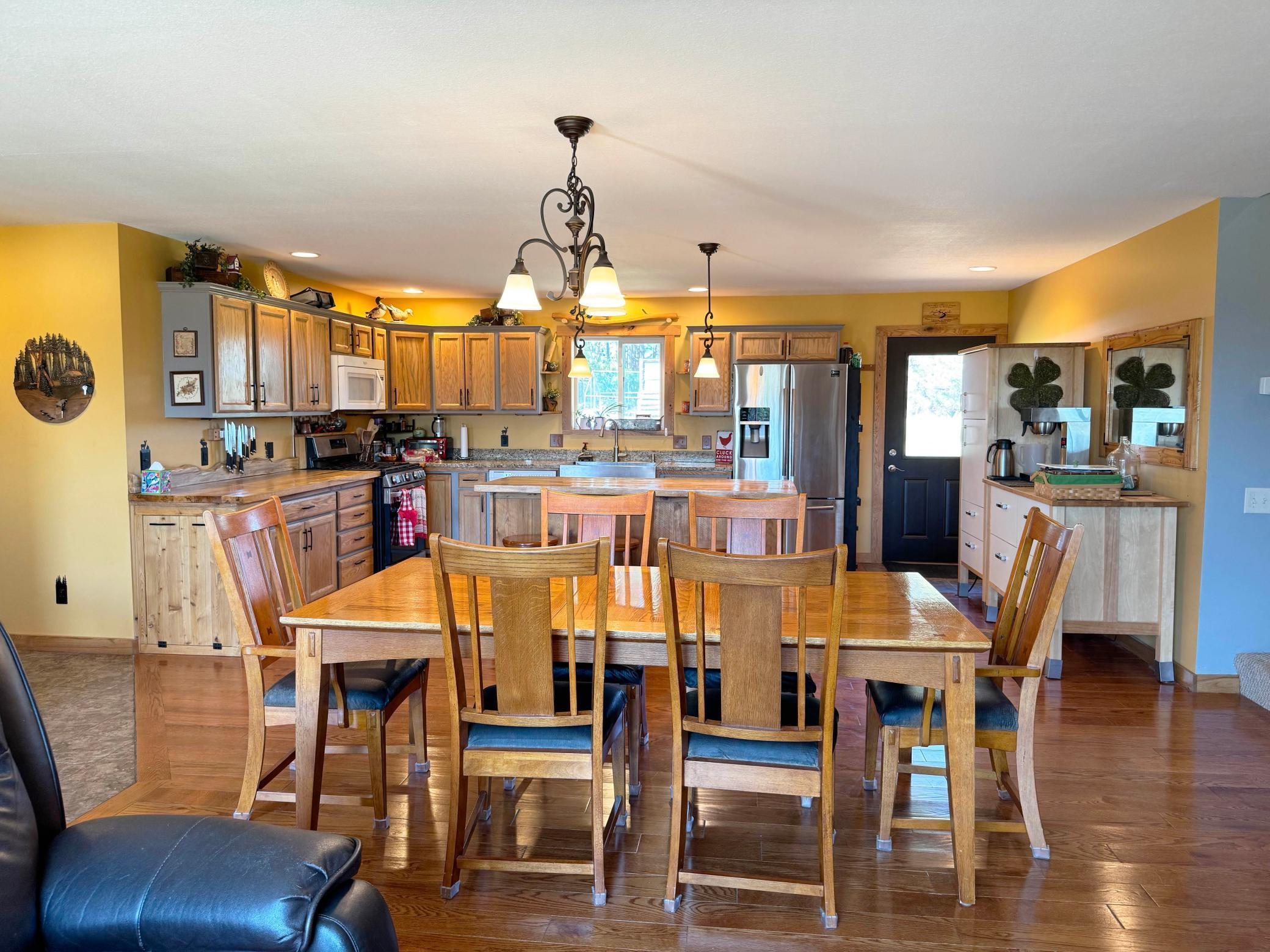 Looking over the dining room to the kitchen beyond.