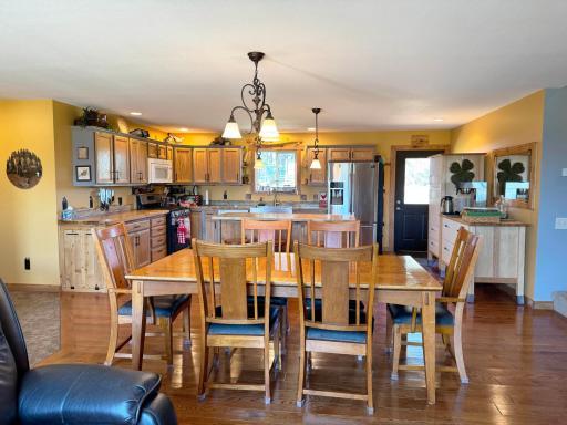 Looking over the dining room to the kitchen beyond.