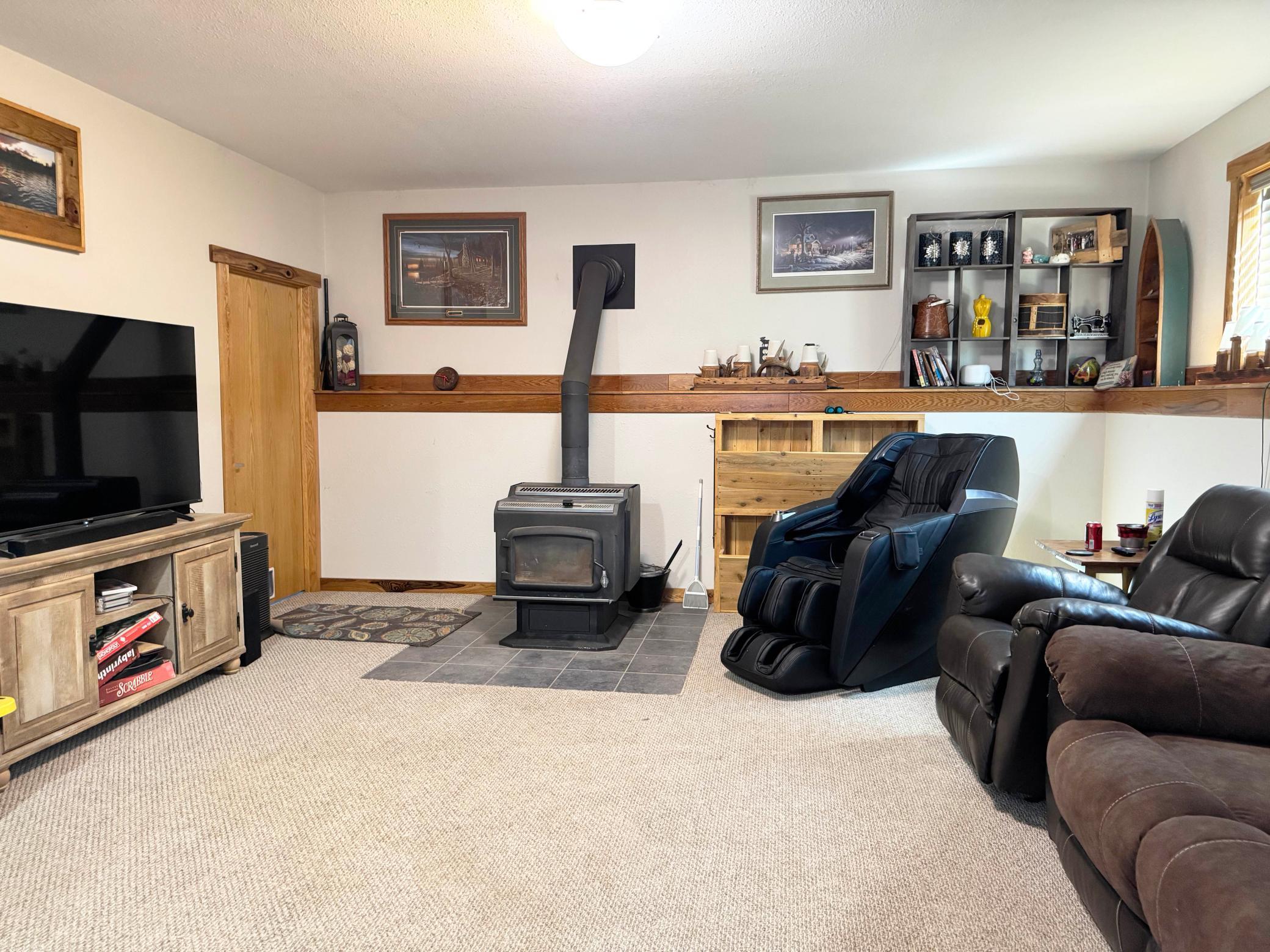 A look at the basement family room. This cozy wood stove kicks out a ton of heat!