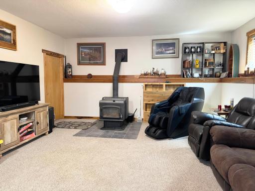 A look at the basement family room. This cozy wood stove kicks out a ton of heat!