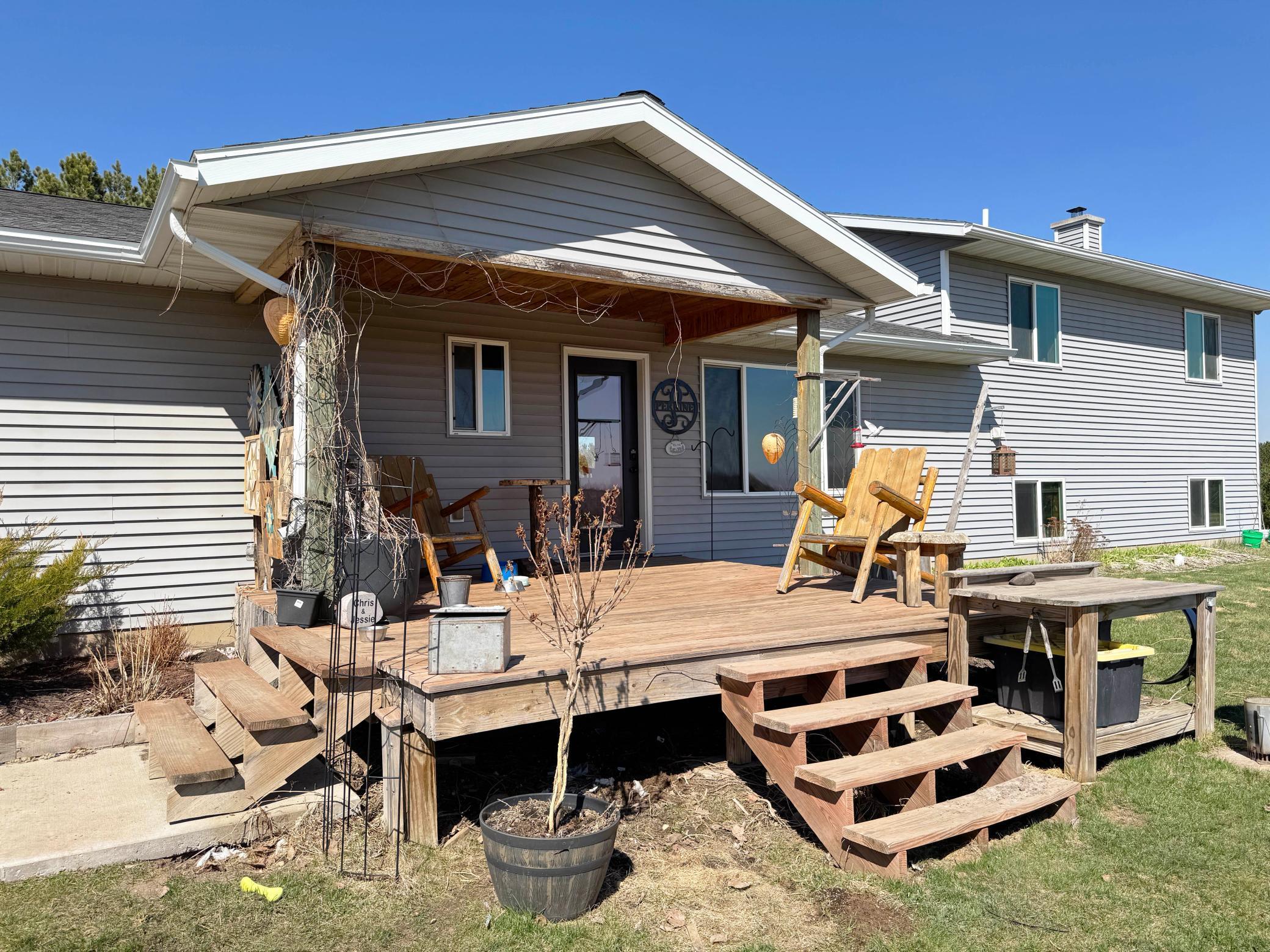 A shot of the charming partially covered porch as you enter the home.