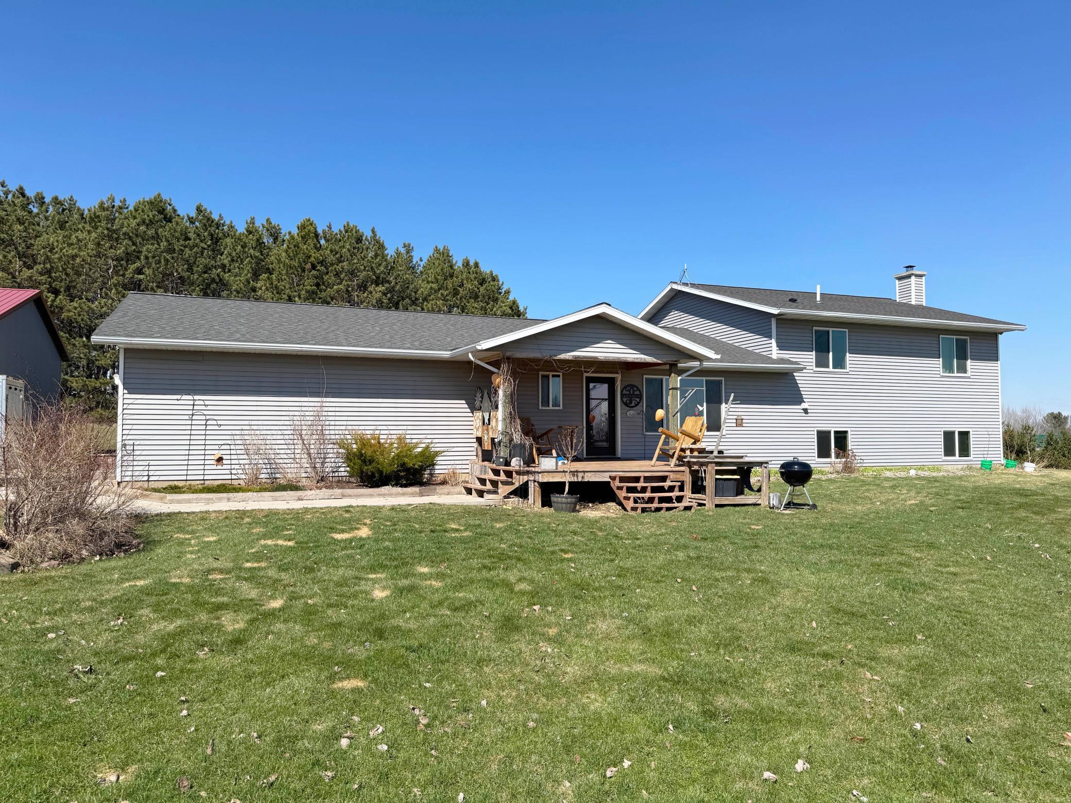 A shot of the home's exterior in "spring!" This is a 2012 construction home offering easy living layout with attached garage.