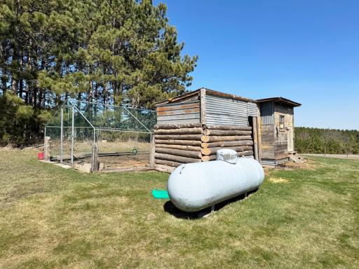 A look at the chicken coop and propane tank.
