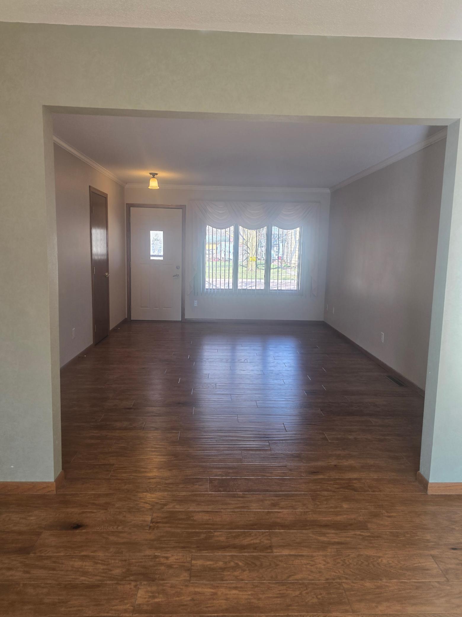 living room showing beautiful wood floors