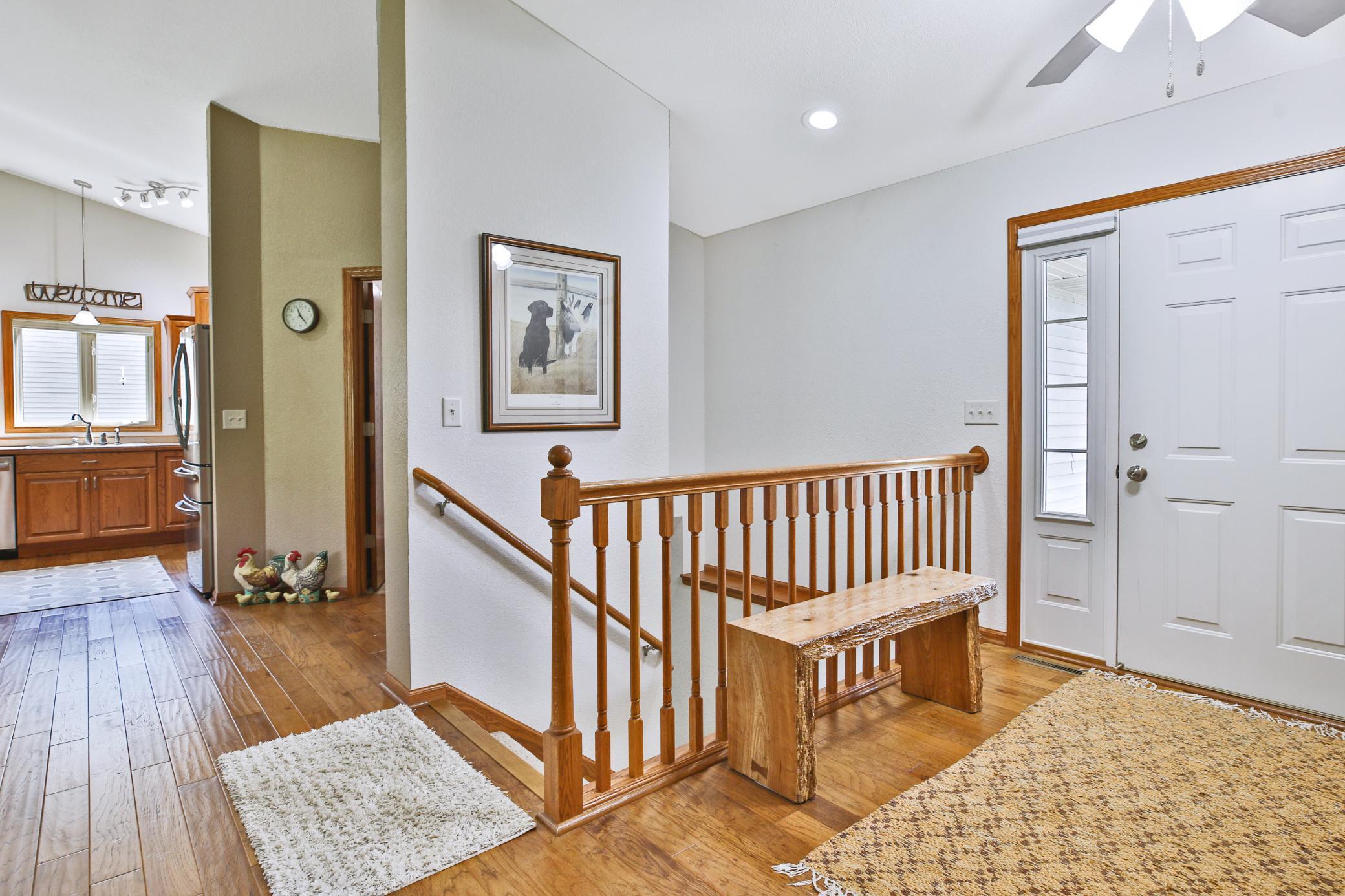 Spacious front entry - notice the sidelight window with at the door.