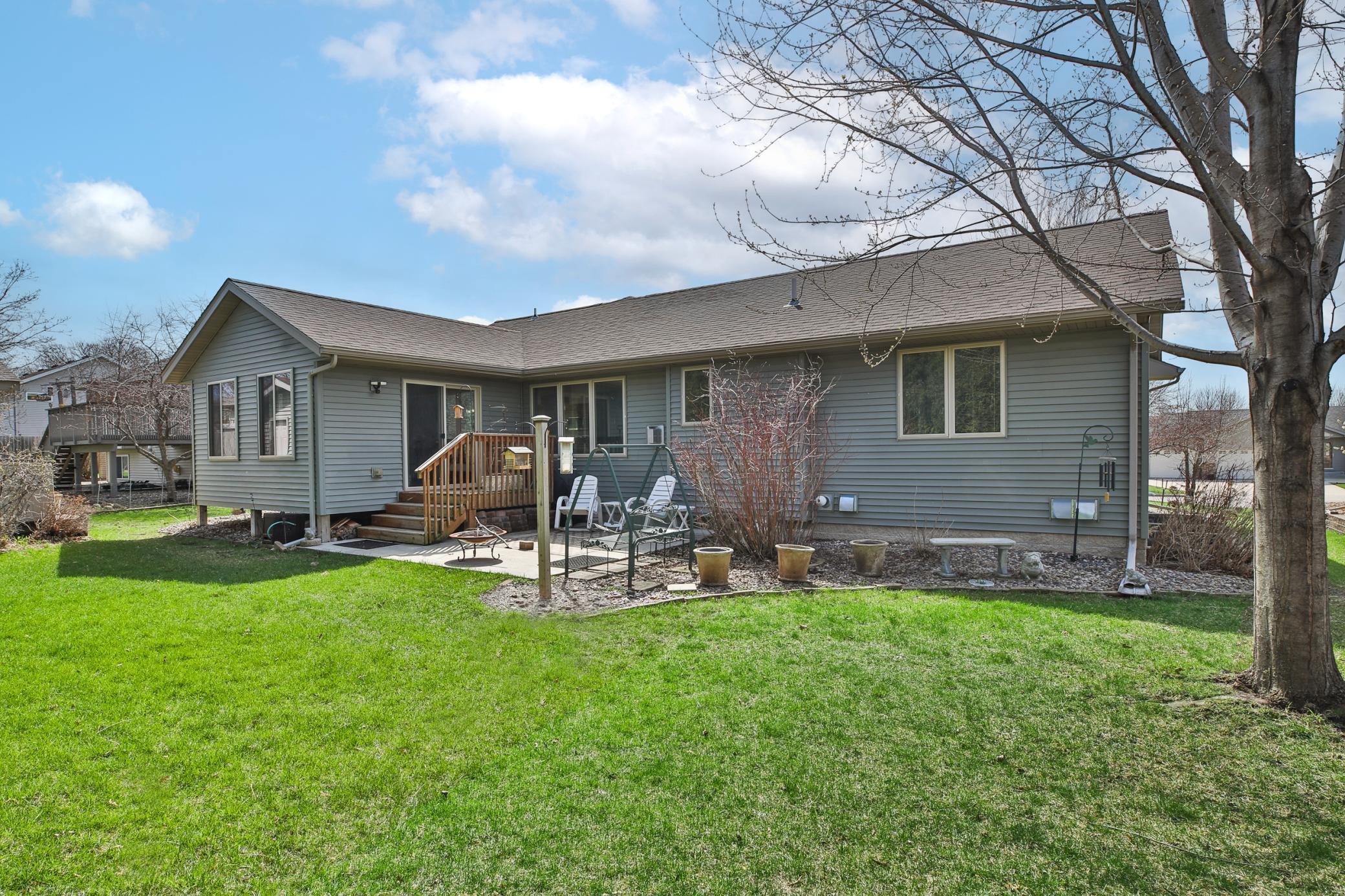Check out the backyard with mature landscaping beginning to bloom
