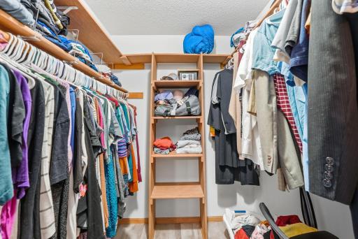 Primary bedroom features a walk in closet