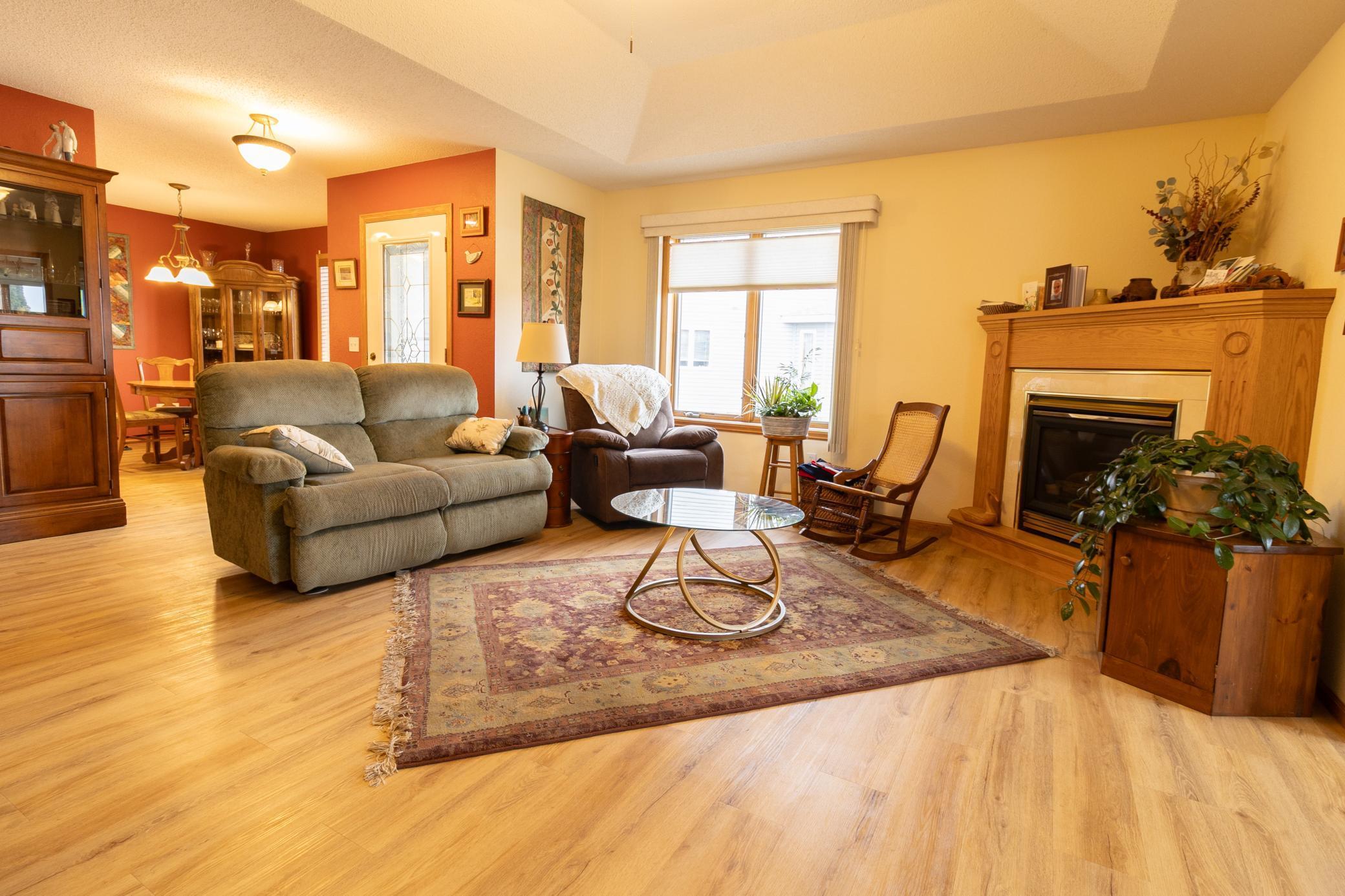 Warm and Inviting Featuring Trayed Ceiling