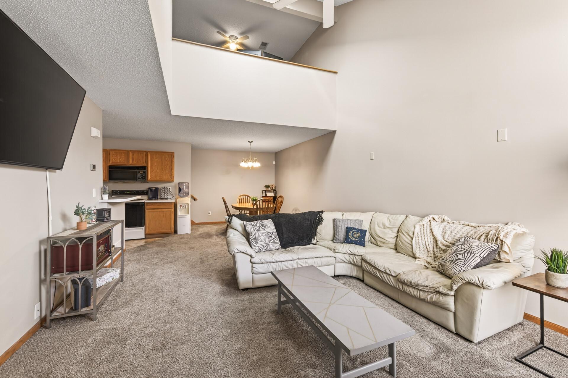 This living area is bigger than it looks especially with the high open ceilings