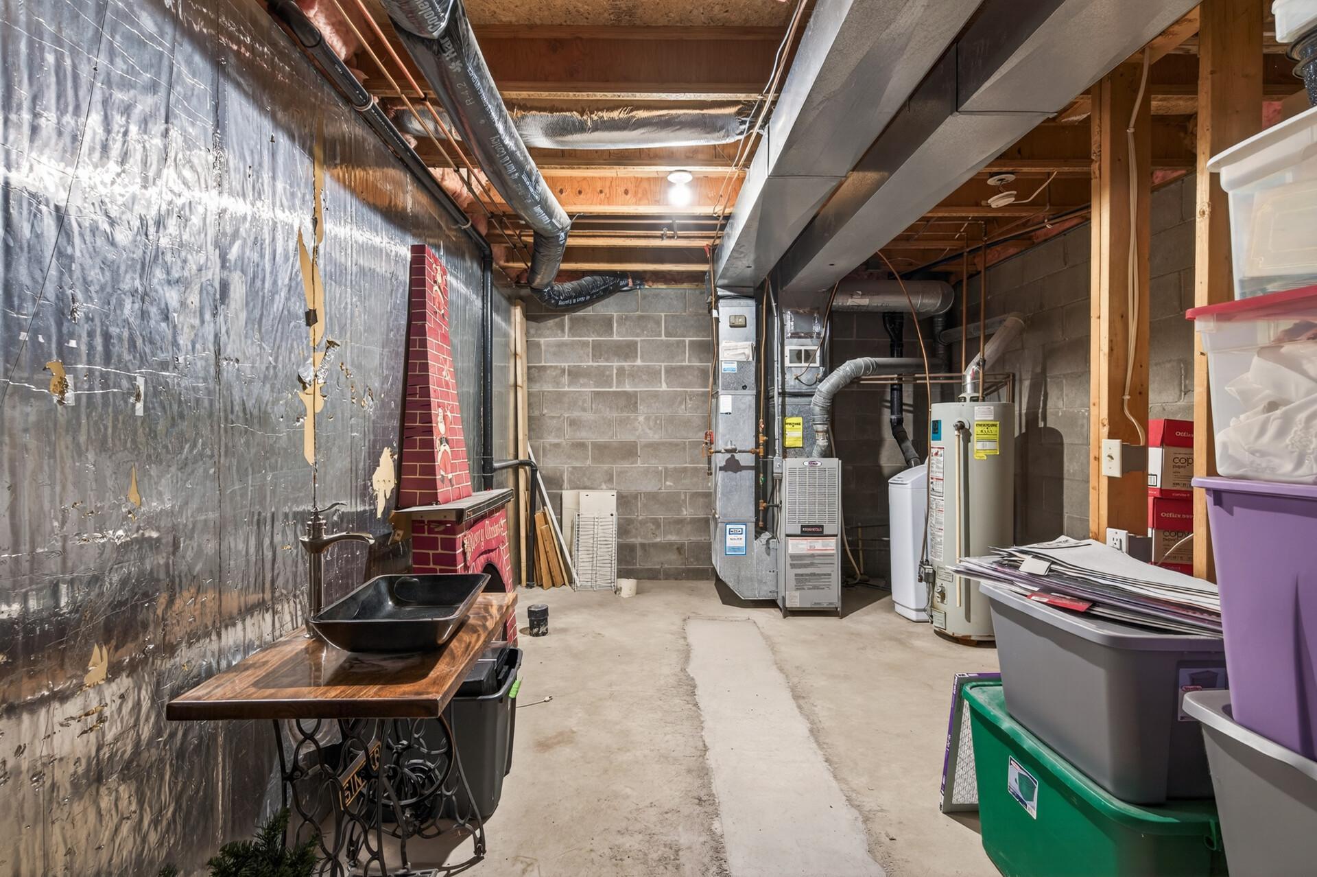 RARE unfinished lower level for storage or finish for rec room and another bath. Build equity.