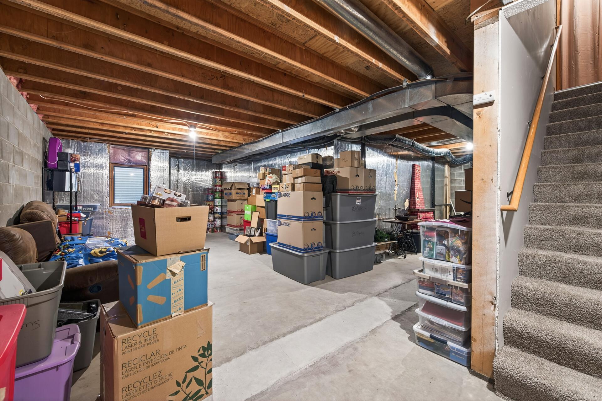 Unfinished lower level with rough in bath ready to finish for family room/rec room or whatever you envision