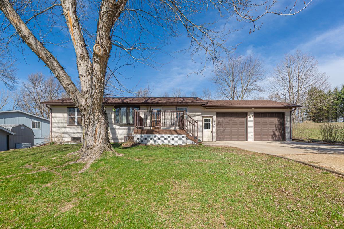 The front of your home has a deck for enjoying the beautiful MN days and evenings