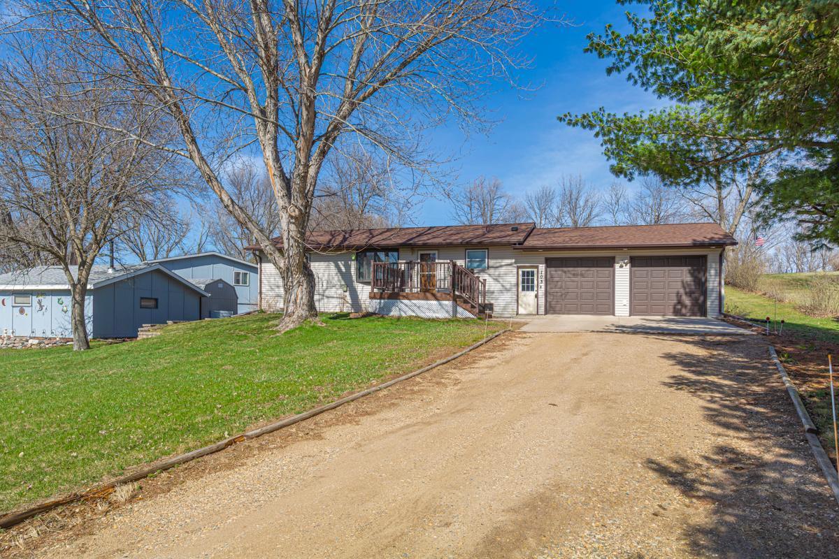 Your new home awaits, and has a long driveway for keeping road noise to a minimum