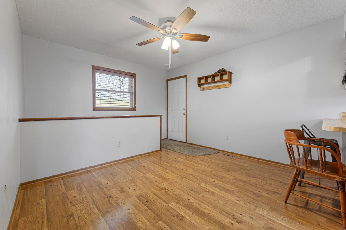 Your dedicated dining space is just inside the home from the garage and is spacious enough for a larger table
