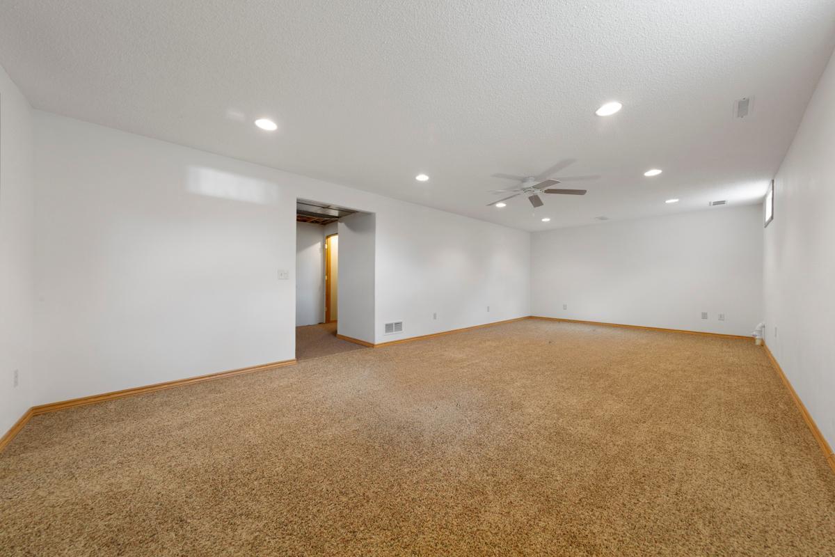 This would be a great movie room, a great place for a pool table, quilting area, or just relaxing