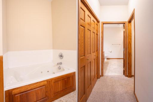 Primary Suite Jet Tub and Walk-in Closet.jpg