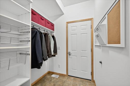 The mudroom off the garage adds convenience.
