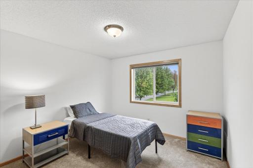 Upper level bedroom #2. Fresh paint and new carpet throughout 2025.