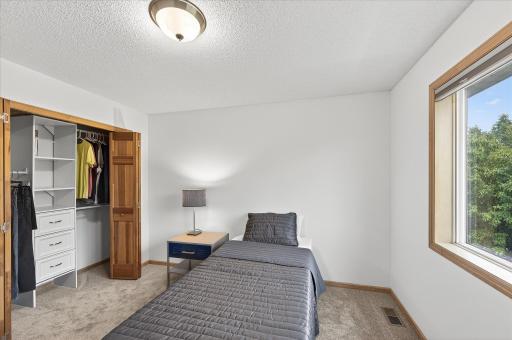 Upper level bedroom #2. Great closet space.