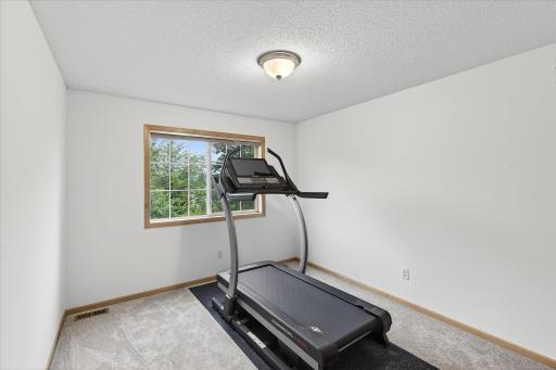 Upper level bedroom #4. Fresh paint and new carpet throughout 2025.