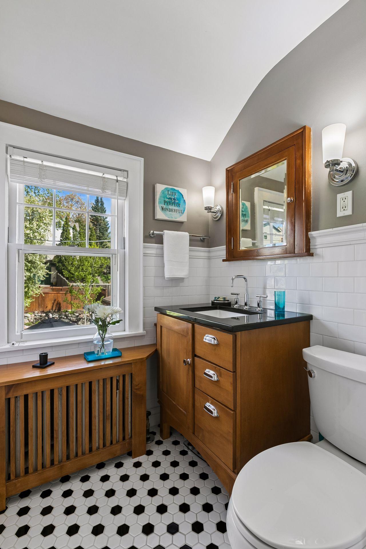 Upper-level full bathroom adds a fun touch of style!